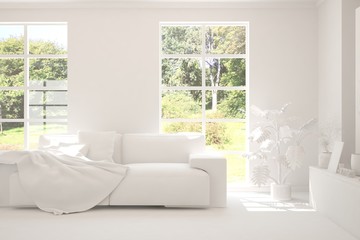 White living room with sofa and summer landscape in window. Scandinavian interior design. 3D illustration