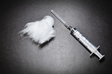 syringe and drug
