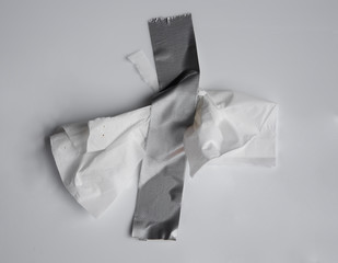 Gray tape on White tissues on gray background.