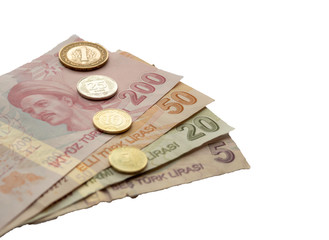 Turkish Lira coins and banknotes on white isolated background.