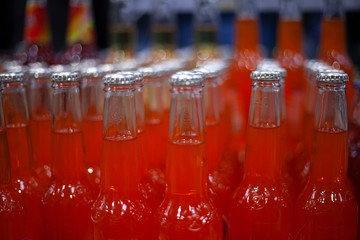 Alcoholic drinks stand in a row.