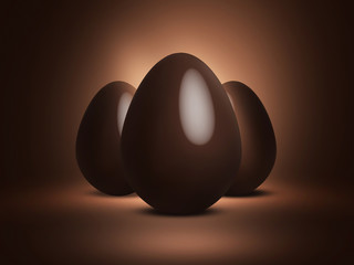Three Chocolate easter eggs in a brown background