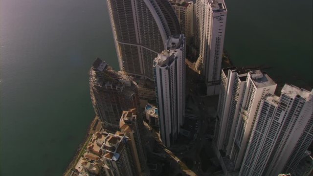 Aerial view of the roofs of residential and commercial skyscrapers of the Punta Pacifica and Punta Paitilla area in Panama City Center and the coast of the bay