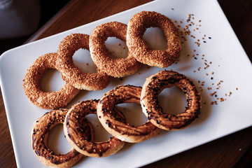 pastry rings consumed in holy days. special pastry cake for a holy day.
fresh sesame pastry rings in holy day.