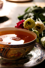 cup of tea with flowers