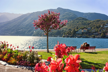 Couple sitting on bench in Ascona © Roman Babakin