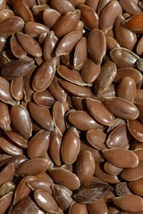 A solid background of peeled flaxseed macro