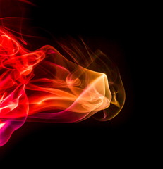 Colored smoke on black background