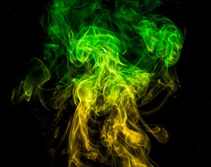 Colored smoke on black background