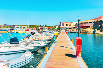 Boats and Villasimius Marina at Mediterranean Sea Sardinia Island