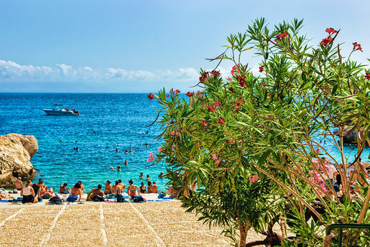 People at beach of Scopello Sicily Italy