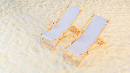 Fototapeta na wymiar 3D image top side of two sunbeds with white fabric staying on the sand beach