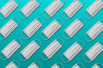 Face masks for first responders on a green background