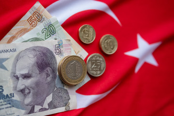 Close-up of Turkish Lira on Turkish Flag. Turkey's donation campaign for the Corona epidemic. 