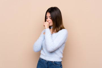 Young woman over isolated background is suffering with cough and feeling bad