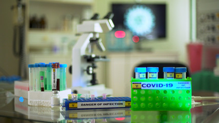 Lab equipment, test tubes and vials with samples used to research a vaccine for the coronavirus COVID19.