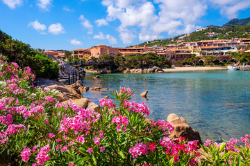 Fototapeta na wymiar Porto Cervo, Sardinia, Italy - Panoramic view of luxury yacht port, marina and residences of Porto Cervo resort at the Costa Smeralda coast of Tyrrhenian Sea