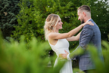 Fototapeta premium Beautiful wedding couple, newlyweds are enjoying wedding