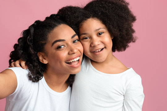 Joyful African American Family Mother And Daughter Posing For Selfie