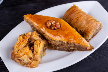 Dessert pahlava, with walnuts and honey

