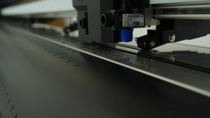 Industrial worker input data programing for CNC milling machine.
