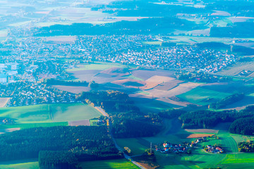 Aerial view of blurred background with beautiful fields in Bavaria, Germany