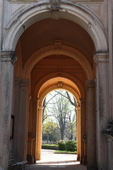 Fototapeta na wymiar Beautiful archway leading to graveyard