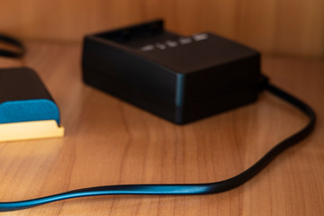 camera battery charger and cord soft focus elementary technology equipment photographers must have...