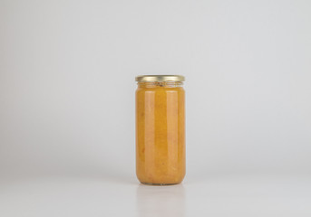 Cherry marmalade in jar, isolated on white