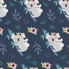 Seamless pattern with cute koala on a blue background. Vector © 210484kate