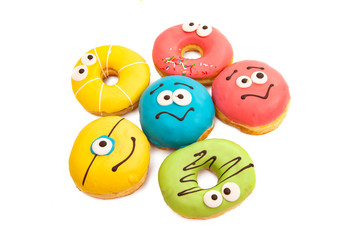 homemade donuts in colored glaze isolated o\
