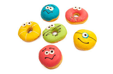 homemade donuts in colored glaze isolated o\