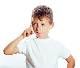 young pretty little boy wondering face gesturing, pointing isolated on white background