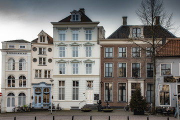 Fototapeta na wymiar The Netherlands in winter with clear skies, buildings and streets