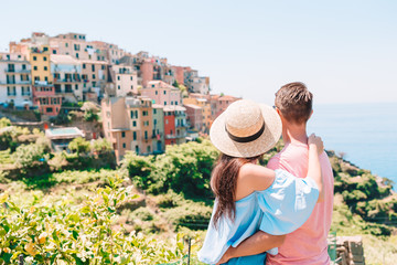 Happy family with view of the old european village in Cinque Terre