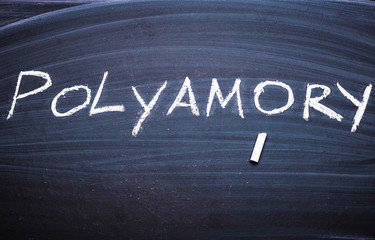 The word polyamorys written on the blackboard