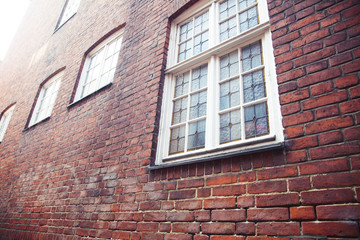 Obraz premium Post card view amber house in Germany Hamburg, european street and roofs closeup