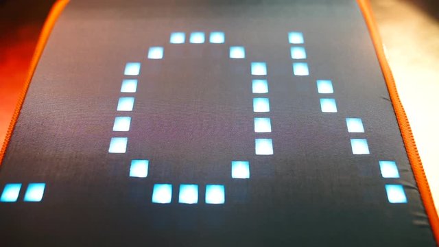 The pixel word love is written on an electronic screen at a kinky party. The concept of the designation of places and information signs.