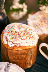 Traditional russian Easter cottage cheese dessert. Orthodox paskha, kulich cakes on table.