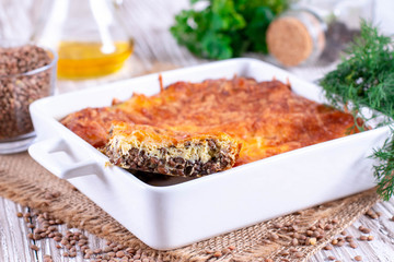 Casserole with lentils, egg and cheese