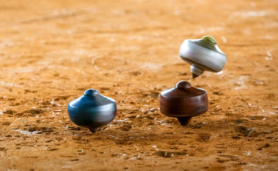A traditional game called gasing or tops spinning. Gasing is Malaysia popular heritage game for tourist in tourism industries