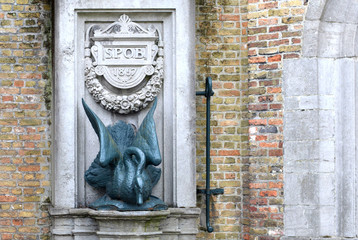 SPQB, Senatus Populus Que Brugensis (The Senate and the People of Bruges) on a pump with an iron swan, one of the symbols of Bruges, created in 1857