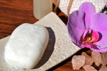 white soap with foam among purple flowers