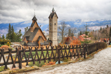 KARPACZ, POLAND - MARCH 09, 2020: Old wooden temple Vang (Wang). Medieval Norwegian stave church...