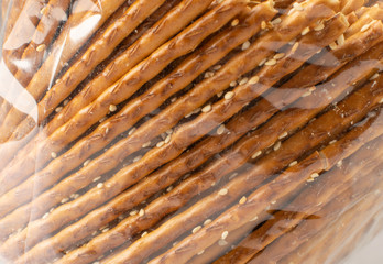 Crispy Salt Sticks with Sesame, Pretzel Sticks, Grissini or Breadsticks