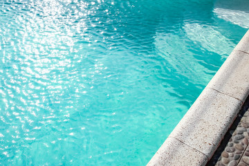 A Pool with steps near the sea. Travel vacation in the park. Vacation background.