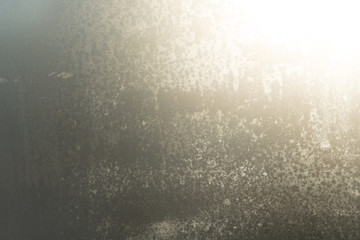 Closeup on fogged blurry glass textured background.