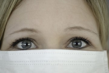 Detail Shot - European women with a mask