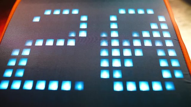 Digits 2020 - 2021 are moving pixels on a gray background. The beginning of the new year. Concept main calendar holiday.