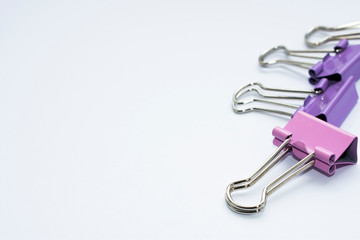 The paper clips are in the right corner on a white background